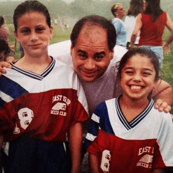 Cari (left) posing with her father and a childhood friend. Credit: Cari Roccaro