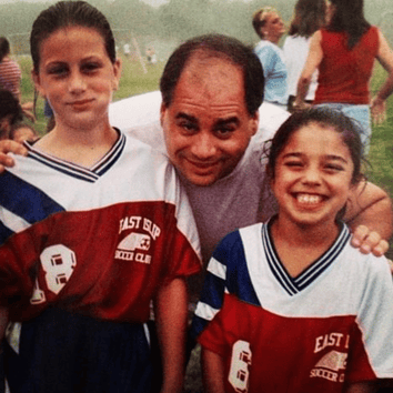 Cari (left) posing with her father and a childhood friend. Credit: Cari Roccaro